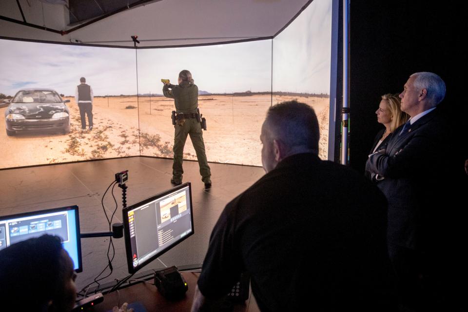 Vice President Mike Pence (right) and Homeland Security Secretary Kirstjen Nielsen (second from right) watches Virtual Simulator Training during a visit to the U.S. Customs and Border Protection's Advanced Training Facility in Harpers Ferry, W.Va., on March 13, 2019.