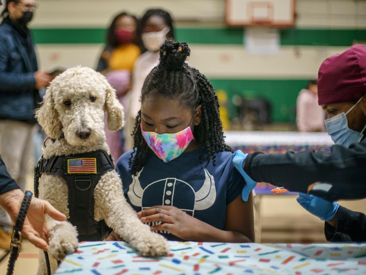 child getting vaccine shot