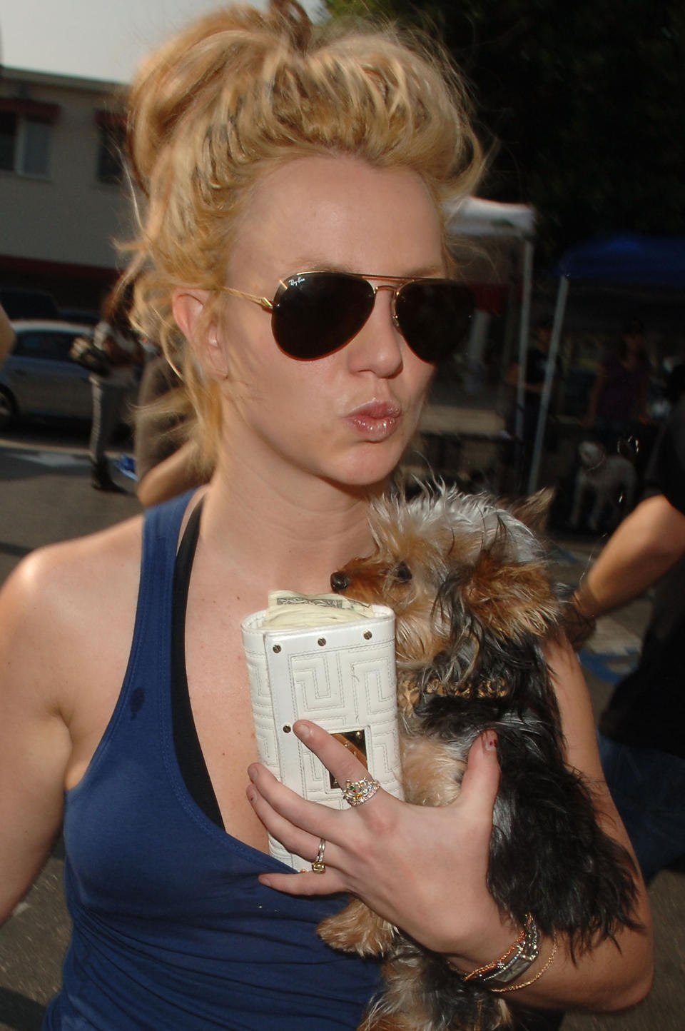 Closeup of Britney holding a dog