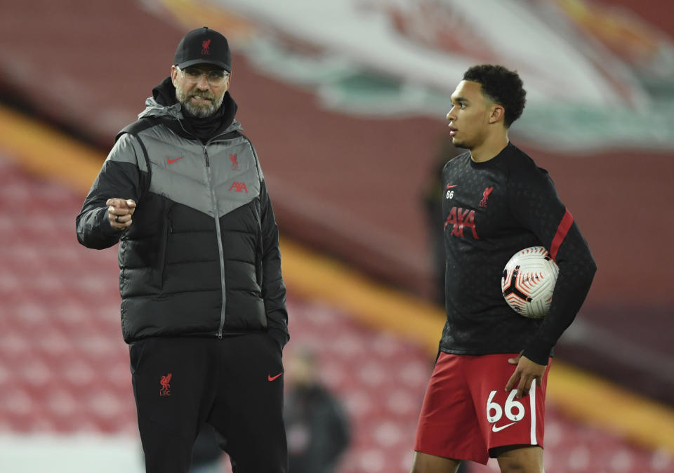 Trent Alexander-Arnold (right) is just one of a spate of Liverpool stars and starters who's injured right now. (Stu Forster/Pool via AP)