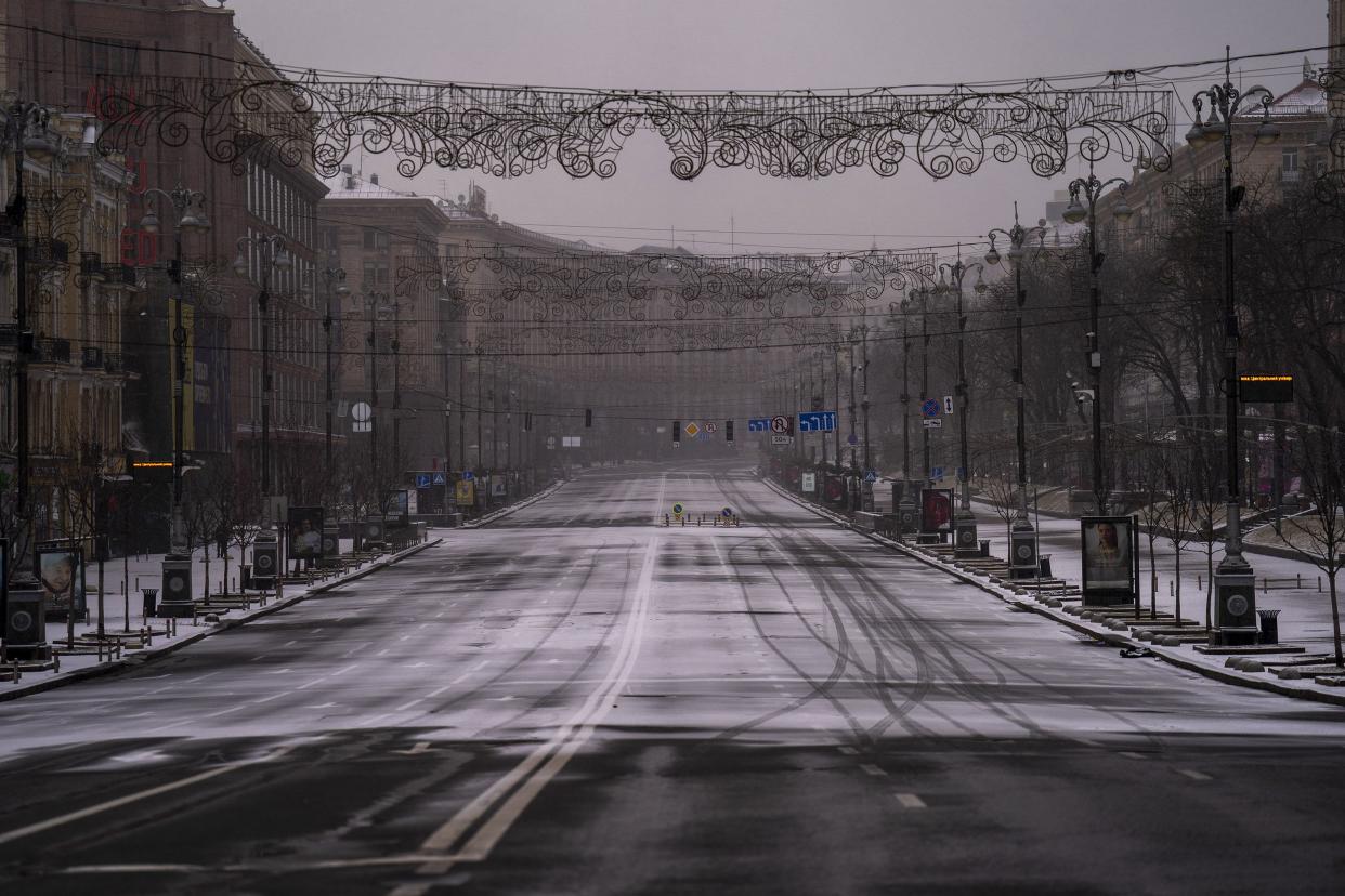 This shows a view of Khreshchatyk, one of the main streets in Kyiv, empty due to curfew, Ukraine, Tuesday, March 1, 2022. Explosions and gunfire that have disrupted life since the invasion began last week appeared to subside around Kyiv overnight, as Ukrainian and Russian delegations met Monday on Ukraine's border with Belarus.