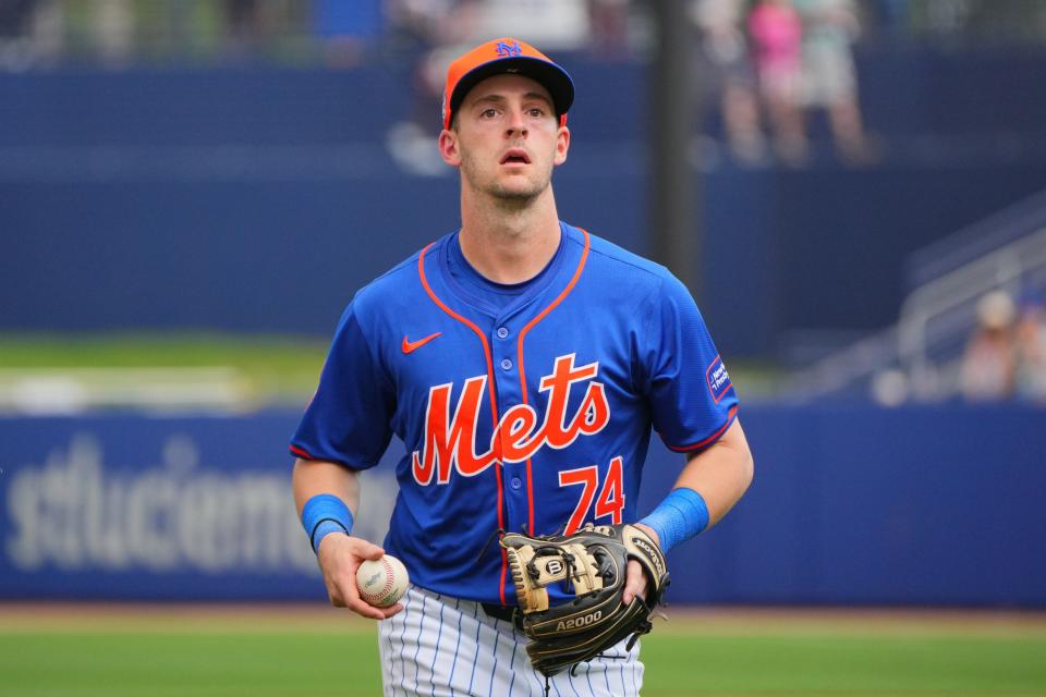 New York Mets shortstop Zack Short heads back to the dugout during an exhibition in spring training against the Houston Astros at Clover Park, March 3, 2024 in Port St. Lucie, Fla.