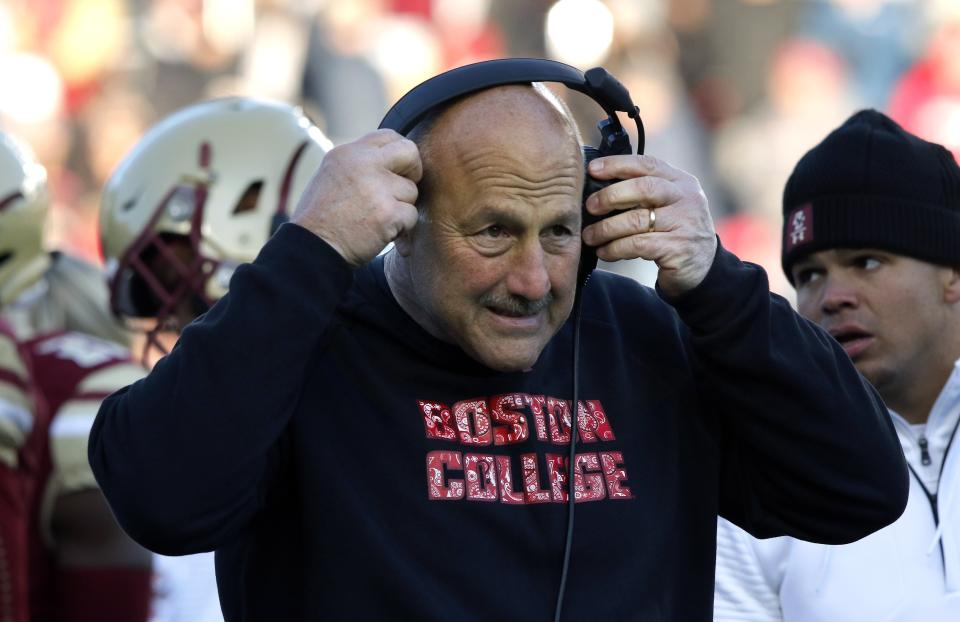 Boston College head coach Steve Addazio adjusts his headset on the sideline in the second half of a game against Florida State on Nov. 9. (AP)