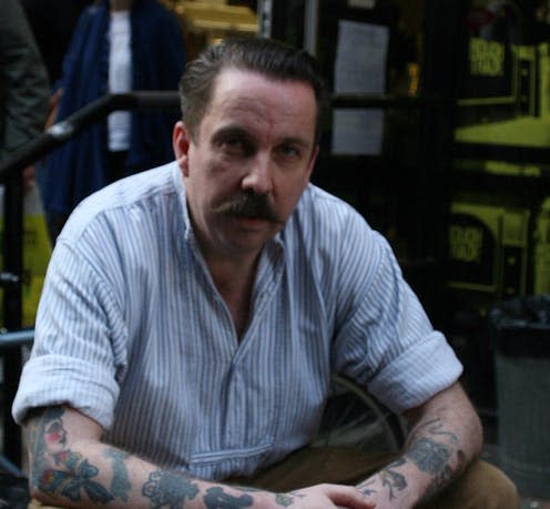 <span class="caption">Andrew Weatherall outside Rough Trade East, London, for Record Store Day 2009.</span> <span class="attribution"><span class="source">Tom McShane via Wikimedia Commons</span>, <a class="link " href="http://creativecommons.org/licenses/by-sa/4.0/" rel="nofollow noopener" target="_blank" data-ylk="slk:CC BY-SA;elm:context_link;itc:0;sec:content-canvas">CC BY-SA</a></span>