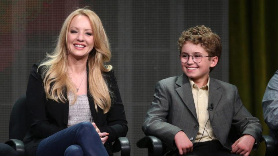 Wendi McLendon-Covey (L) and Sean Giambrone speak onstage during the “The Goldbergs” panel discussion at the Disney/ABC Television Group portion of the Television Critics Association Summer Press Tour at the Beverly Hilton Hotel on August 4, 2013