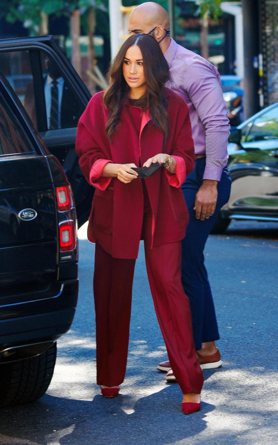 The Duchess of Sussex wearing a burgundy palette in New York last month