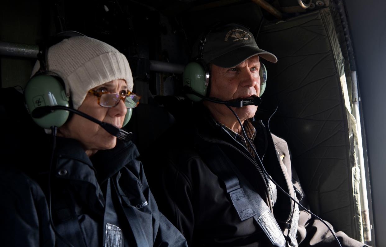 First lady Maria Lee and Gov. Bill Lee ride in a Black Hawk helicopter before seeing the damage left after a series of tornados swept through Tennessee, Sunday, Dec. 10, 2023.