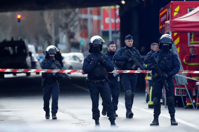 French police secure an area after a knife attack in a public park in Villejuif