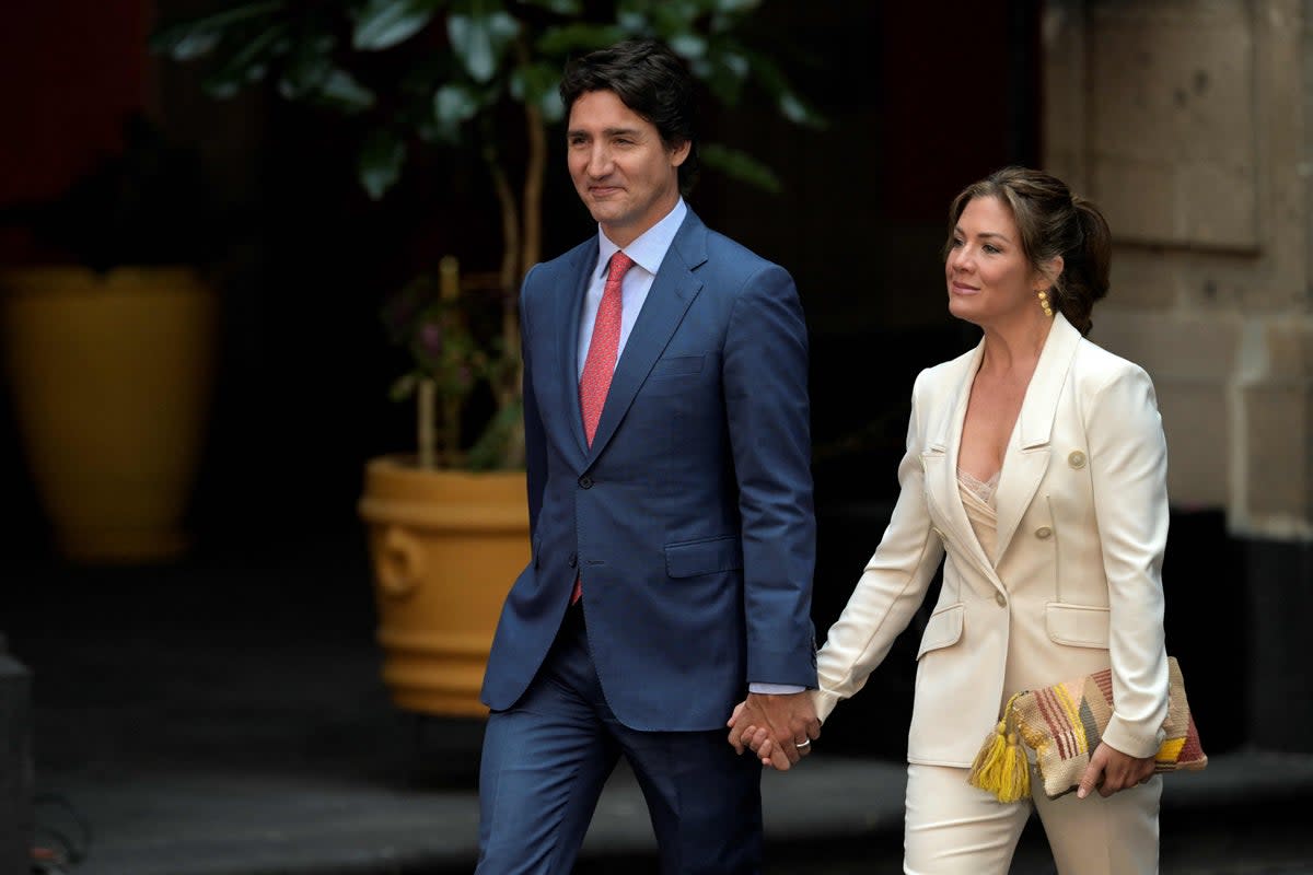 Justin Trudeau and wife Sophie Grégoire-Trudeau arrive at the presidential palace, in Mexico City  (Nicolas Asfouri / AFP via Getty Images)