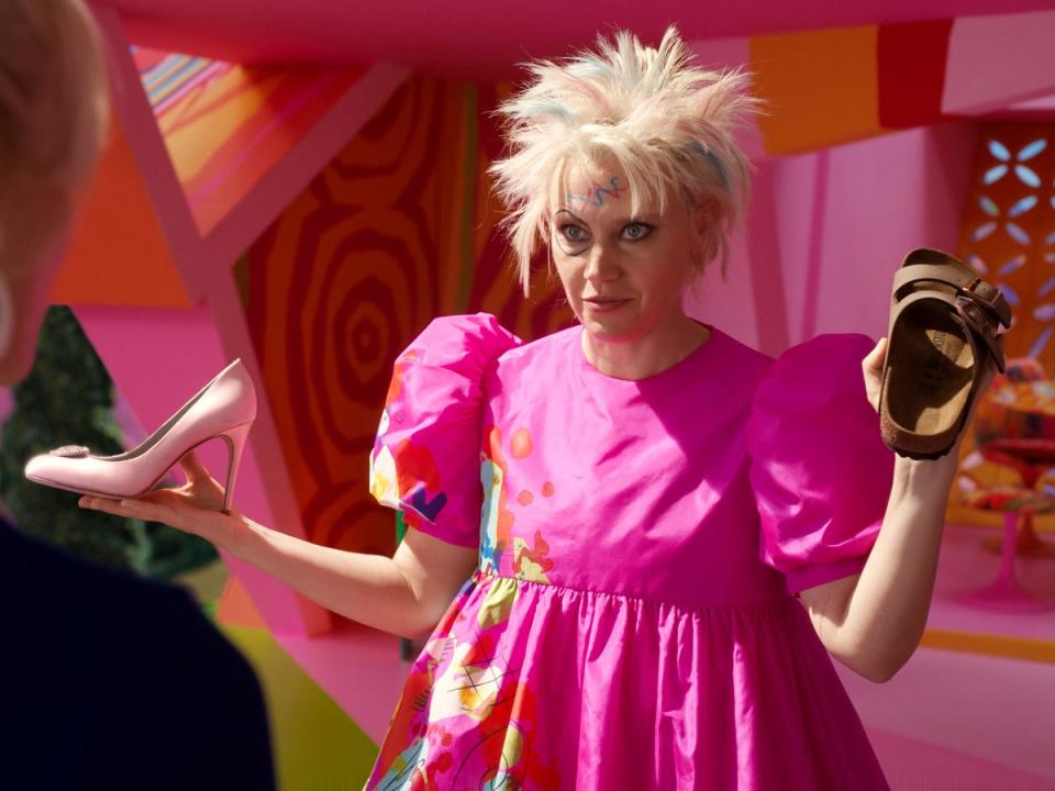 In ‘Barbie’, Kate McKinnon’s Weird Barbie lives with a collection of discontinued dolls (Warner Bros)