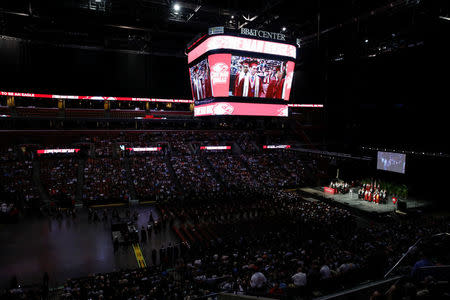 Students from Marjory Stoneman Douglas High School attend their graduation ceremony in Sunrise, Florida, U.S., June 3, 2018. REUTERS/Carlos Garcia Rawlins