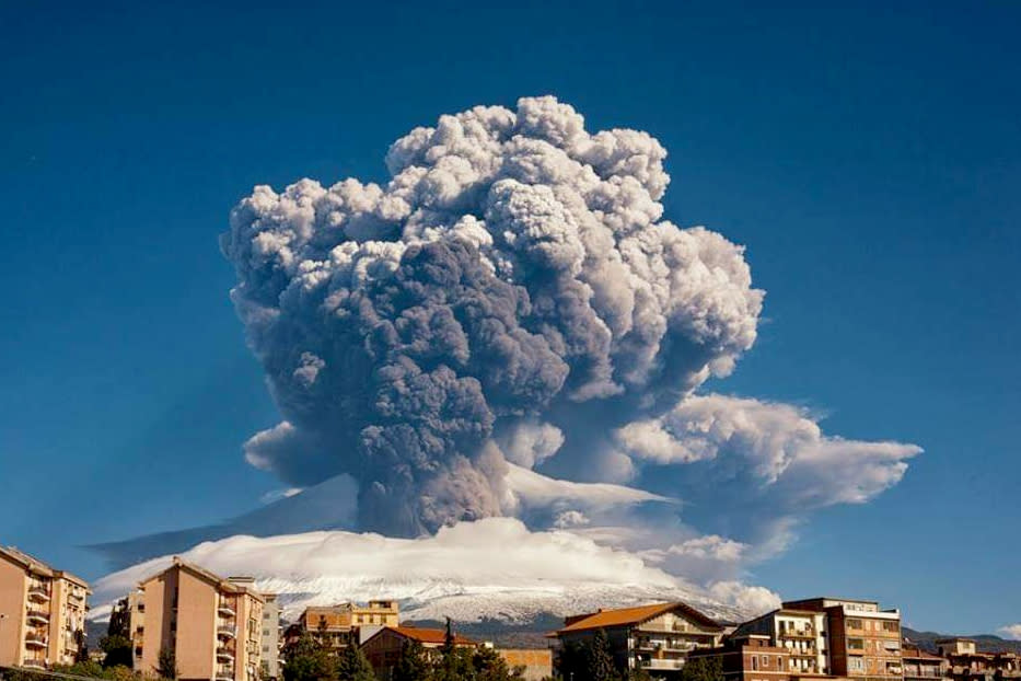 Smoke billows from Mount Etna, Europe’s most active volcano, Tuesday, Feb. 16, 2021. Mount Etna in Sicily, southern Italy,  has roared back into spectacular volcanic action, sending up plumes of ash and spewing lava. (Davide Anastasi/LaPresse via AP)