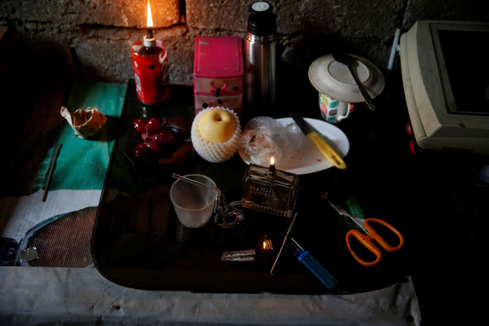 <p>Sachets of shabu, or methamphetamine (middle-lower part), is pictured among other drugs paraphernalia at an undisclosed drug den in Manila, Philippines on June 20, 2016. (REUTERS/Staff) </p>