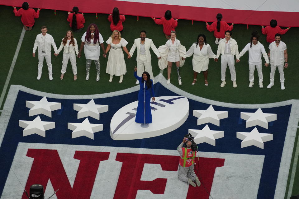 Country music artist Mickey Guyton performs the national anthem before the NFL Super Bowl 56 football game between the Los Angeles Rams and the Cincinnati Bengals, Sunday, Feb. 13, 2022, in Inglewood, Calif. (AP Photo/Morry Gash)