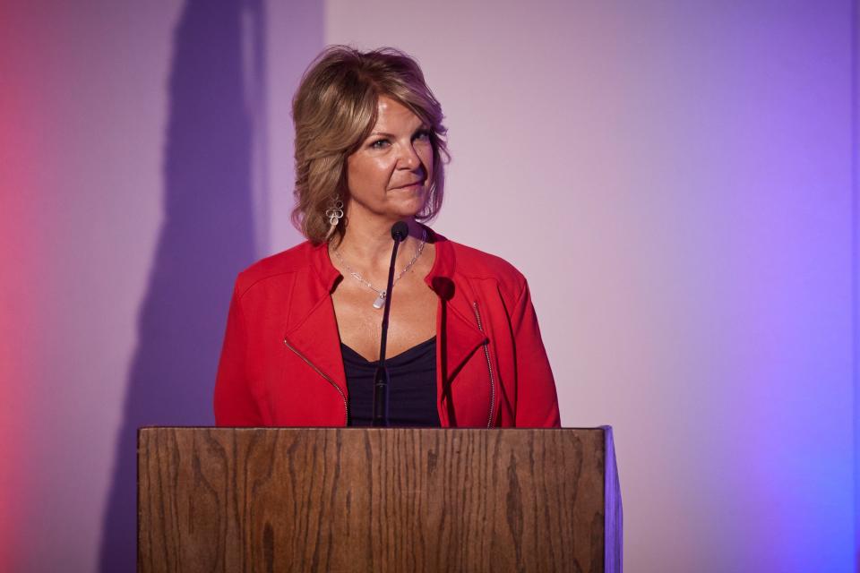 Arizona Republican Party chair Kelli Ward moderates a debate between Arizona state Reps. Shawnna Bolick and Mark Finchem during the Arizona Republican primary debate for Secretary of State at the East Valley Institute of Technology in Mesa on June 9, 2022.