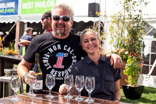 <p>Gamma Nine</p> Guy Fieri and Brooke Williamson at the Classic