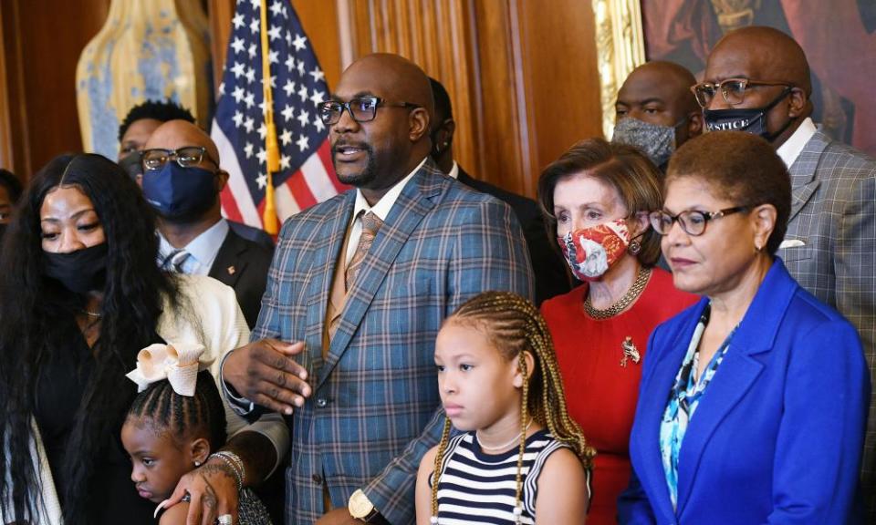 Philonise Floyd, brother of George Floyd, speaks as he and members of the Floyd family meet with Nancy Pelosi, second right, and Karen Bass, right, in May.