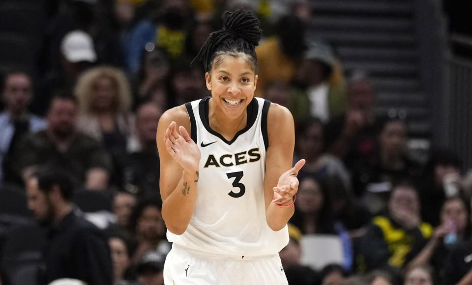FILE - Las Vegas Aces forward Candace Parker (3) reacts during the first half of a WNBA basketball game against the Seattle Storm, Saturday, May 20, 2023, in Seattle. The Las Vegas Aces announced Wednesday, Feb. 7, 2024, they re-signed Candace Parker. She is a two-time league MVP and three-time WNBA champion. The Aces have won back-to-back titles (AP Photo/Lindsey Wasson, File)