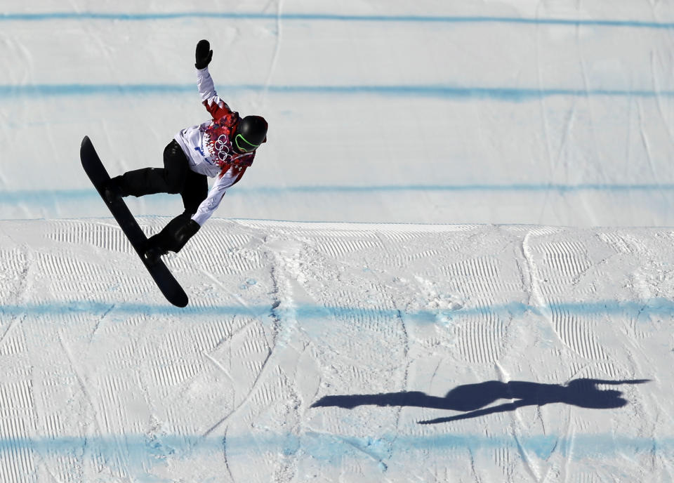 Canada's Mark McMorris lands from a jump during the men's snowboard slopestyle qualifying at the Rosa Khutor Extreme Park ahead of the 2014 Winter Olympics, Thursday, Feb. 6, 2014, in Krasnaya Polyana, Russia. (AP Photo/Andy Wong)