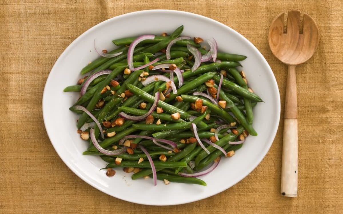 <p>Parade</p><p>The unexpected addition of smoked almonds kicks this healthy side dish up a notch.</p><p><strong>Get the Recipe: </strong><strong><a href="/842280/communitytable/green-bean-salad-with-smoky-almonds/" data-ylk="slk:Smoky Green Beans;elm:context_link;itc:0;sec:content-canvas" class="link rapid-noclick-resp">Smoky Green Beans</a></strong></p><p><strong>Related: 17 of the <a href="https://parade.com/846871/melaniemcdonald/the-best-vegan-thanksgiving-main-dish-recipes/" rel="nofollow noopener" target="_blank" data-ylk="slk:Best Vegan Thanksgiving Main Dish Recipes;elm:context_link;itc:0;sec:content-canvas" class="link rapid-noclick-resp">Best Vegan Thanksgiving Main Dish Recipes</a></strong></p>