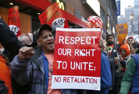 Fast food workers attend a protest against McDonald's outside one of its restaurants in New York, in this file photo taken December 5, 2013REUTERS/Eduardo Munoz/Files