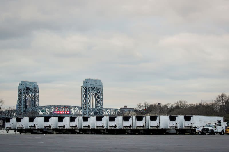 FILE PHOTO: Refrigerated tractor trailers that can be used by hospitals for makeshift morgues are seen, during the coronavirus disease (COVID-19) outbreak, in Icahn Stadium parking lot on Randall's Island in New York