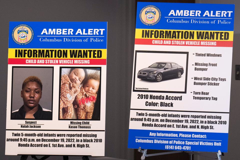 Information regarding the remaining missing Thomas twin, Kason Thomas, pictured left in the photograph of the twins, is seen during a press event at the the Columbus Police Headquarters, along with a picture of the Columbus Police Department’s suspect, Nalah Jackson, and the stolen vehicle.