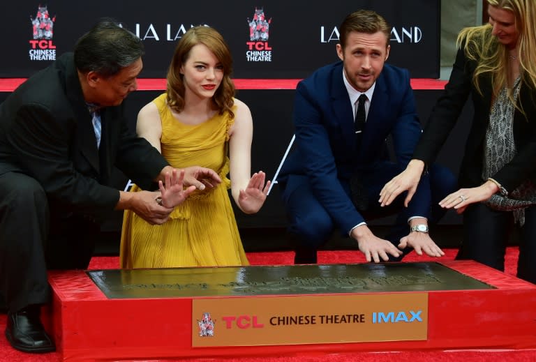 Actors Emma Stone and Ryan Gosling at their Hand and Foot prints ceremony in front of the TCL Chinese Theater in Hollywood on December 7, 2016 ahead of the release of the film LA LA Land