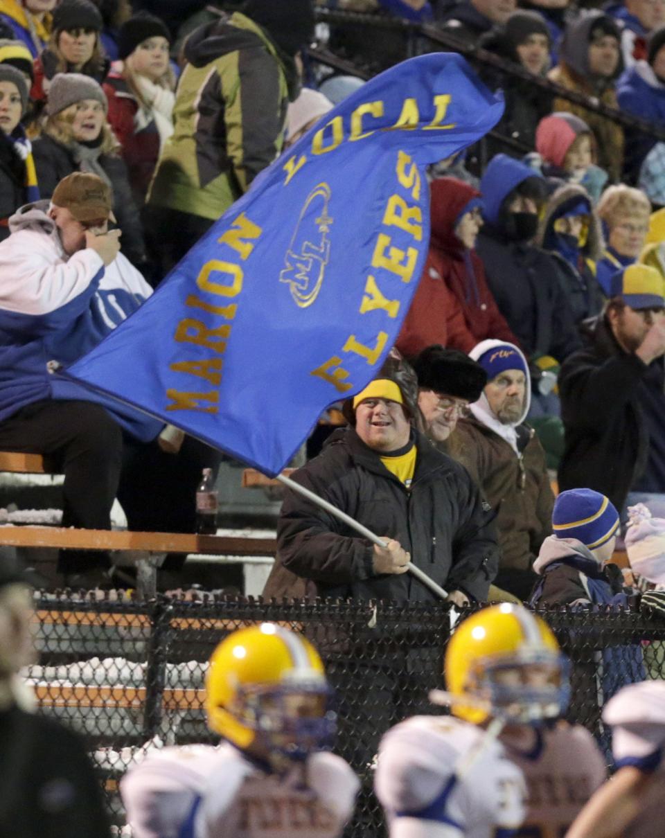 Marion Local football fans cheer during the 2013 state finals.