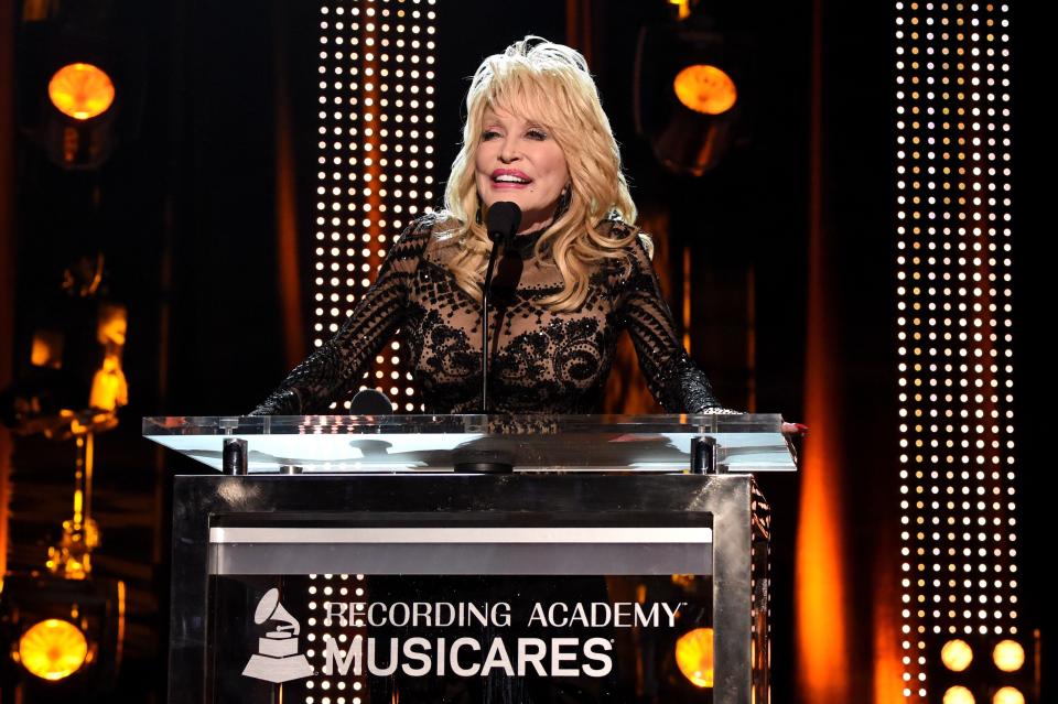 LOS ANGELES, CA - FEBRUARY 08:  Dolly Parton accepts the MusiCares Person of the Year award onstage during MusiCares Person of the Year honoring Dolly Parton at Los Angeles Convention Center on February 8, 2019 in Los Angeles, California.  (Photo by Kevin Mazur/Getty Images for The Recording Academy)