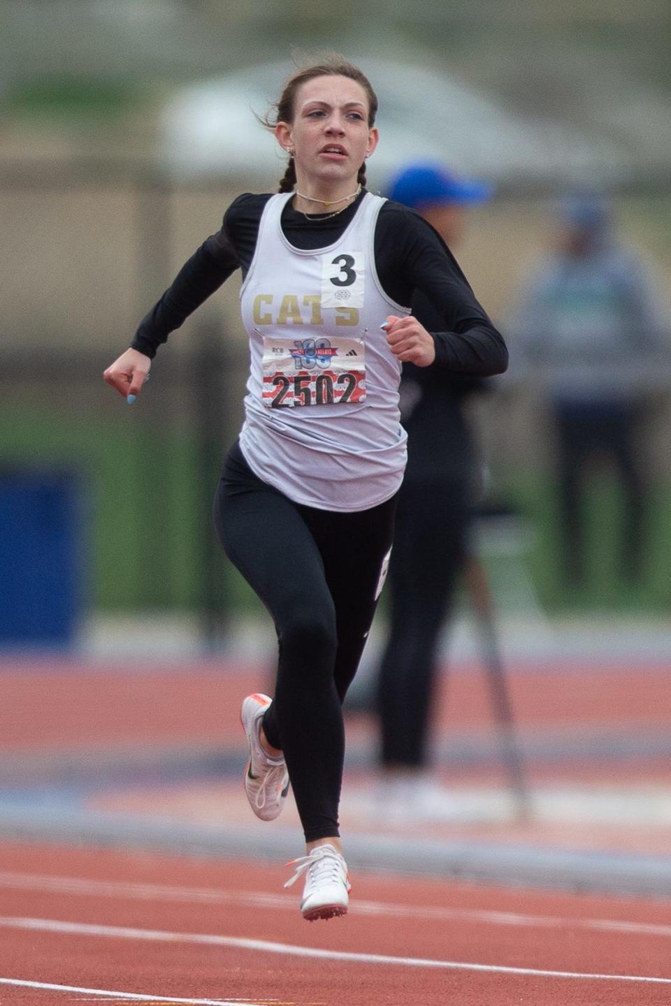 Hayden Natalie Hillebert races in the girls 400 meter at last year's Kansas Relays Saturday at Rock Chalk Park.