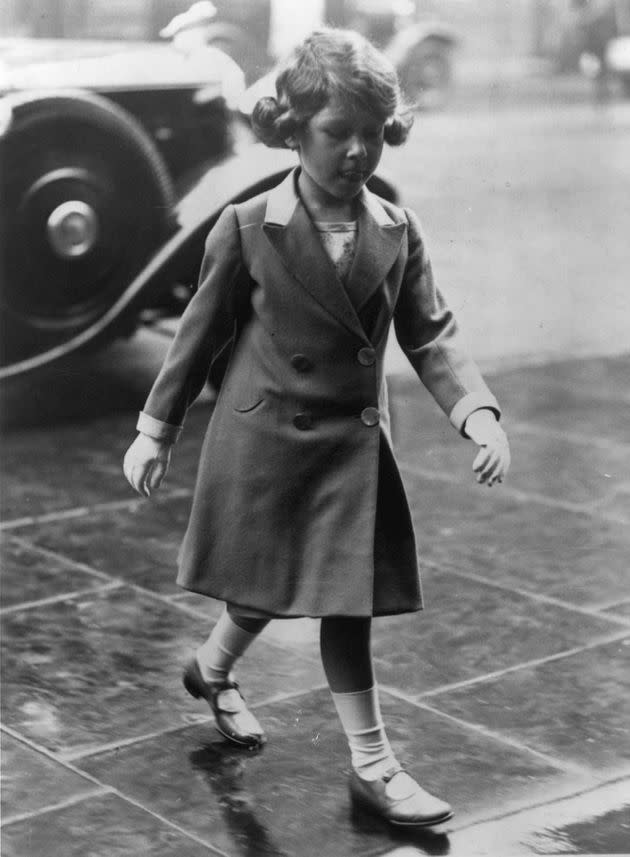 Princess Elizabeth walks in to visit the Royal Tournament at Olympia in 1932. (Photo: Hulton Archive/Getty Images)