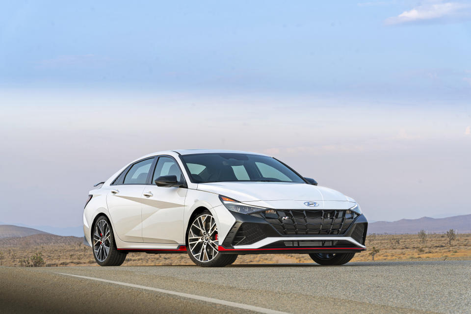 This photo provided by Hyundai shows the 2022 Hyundai Elantra N, a sporty sedan based on an economy car but reengineered to put out 276 horsepower. (Courtesy of Hyundai Motor America via AP)