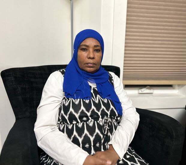 Ebstam Elsheikh said only one of her brothers has managed to escape the war in Sudan. She said she works for a 'decent wage,' but still can't accumulate the money the federal government requires to get her family here. (Submitted by Ebtsam Elsheikh)