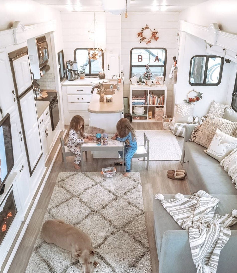 Two little girls sitting in the kitchen of April Gilleland's RV