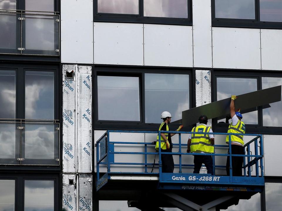 Cladding was removed from the side of Whitebean Court in Salford, Manchester (Reuters)