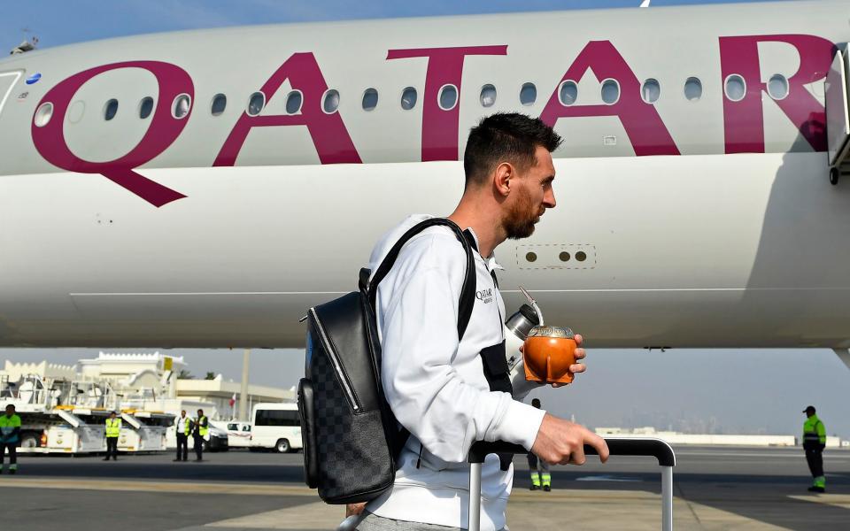  Leo Messi walks on the tarmac to the plane before the friendly match between Paris Saint-Germain and Riyadh XI - GETTY IMAGES