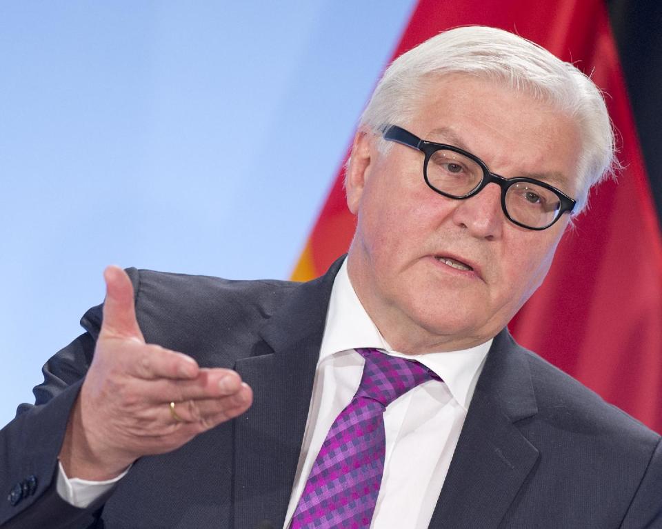 German Foreign Minister Frank-Walter Steinmeier gestures during a press conference at the Weimar Triangle meeting in the city castle in Weimar, Germany, Tuesday, April 1, 2014. Steinmeier renewed a push for internationally backed direct talks between Russia and Ukraine as he consulted with fellow European powers Poland and France Tuesday amid what he called tentative signs of de-escalation. (AP Photo/Jens Meyer)