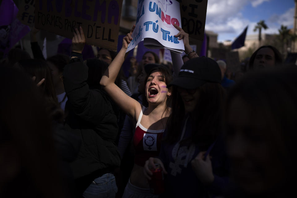 Students march during an International Women's Day protest in Barcelona, Spain, Friday, March 8, 2024. Spanish women are marking International Women's Day with a full day strike and dozens of protests across the country against wage gap and gender violence.(AP Photo/Emilio Morenatti)