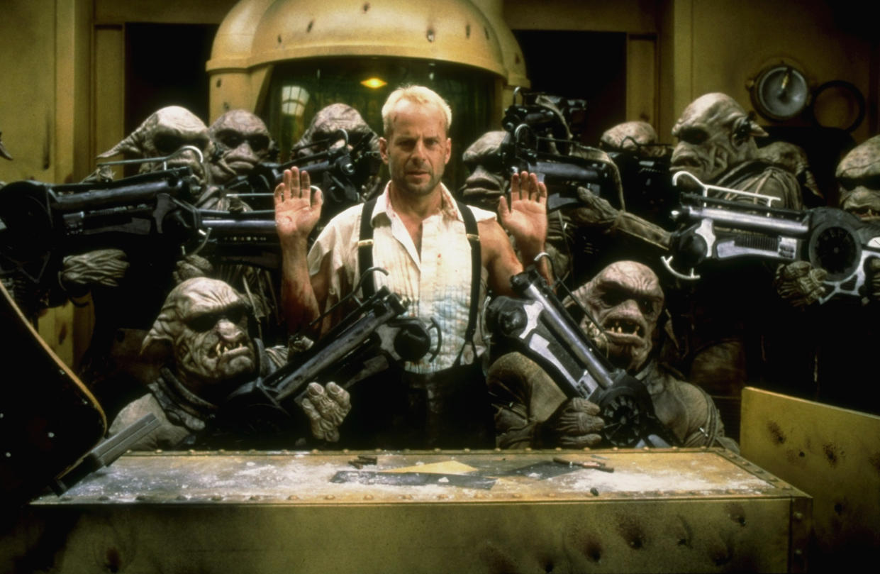 Willis with a gaggle of aliens in The Fifth Element (Photo: Columbia Pictures/Courtesy: Everett Collection)