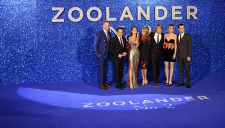 (L-R) Will Ferrell, Ben Stiller, Penelope Cruz, Christine Taylor, Owen Wilson, Kristen Wiig and Justin Theroux pose for photographers at the screening of Zoolander 2 at a cinema in central London, February 4, 2016. REUTERS/Dylan Martinez