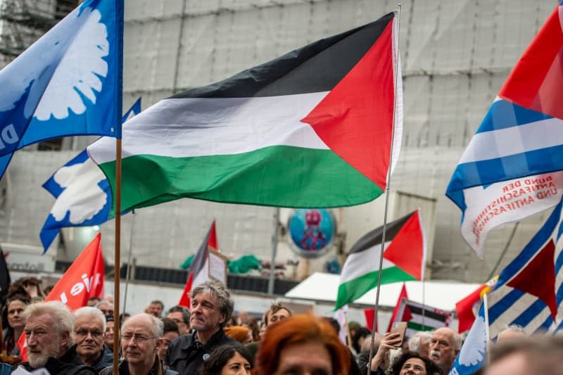 People Holding Palestinian Flags And Flags With Doves Of Peace Gather On Roncalliplatz For The Easter March Under The Motto &Quot;For A Civil Turnaround - End Wars, Stop Rearmament!&Quot;. Christian Knieps/Dpa