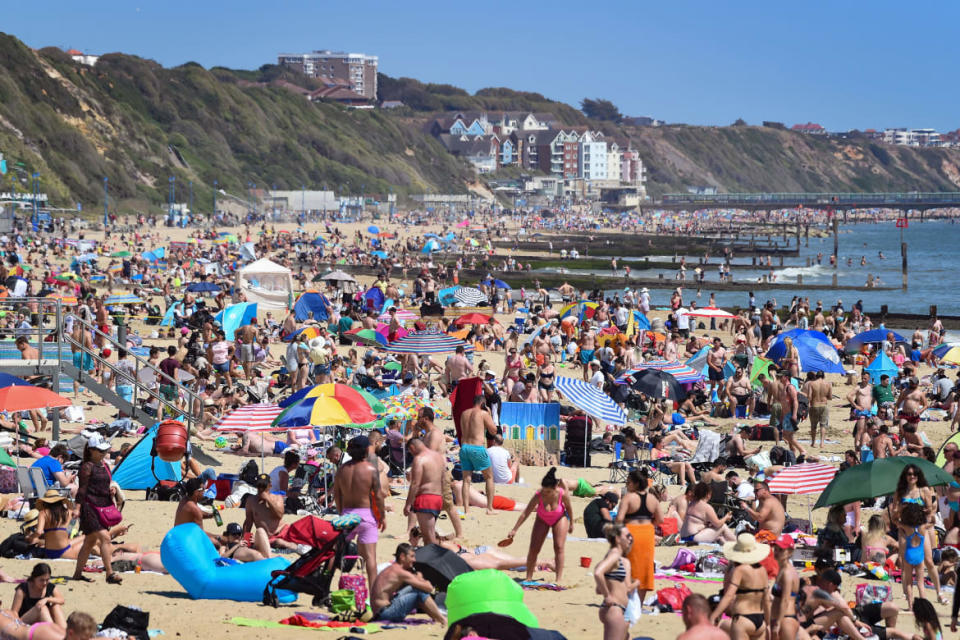 <div class="inline-image__caption"><p>Tourists enjoyed the hot weather at Bournemouth beach on May 25, 2020 in Bournemouth, United Kingdom. The British government has started easing the lockdown it imposed two months prior to curb the spread of COVID-19, abandoning its 'stay at home' slogan in favor of a message to 'be alert', but UK countries varied in their approaches to relaxing quarantine measures.</p></div> <div class="inline-image__credit">Finnbarr Webster/Getty</div>