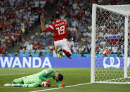 <p>Croatia goalkeeper Danijel Subasic makes a save in front of Russia’s Alexander Samedov </p>