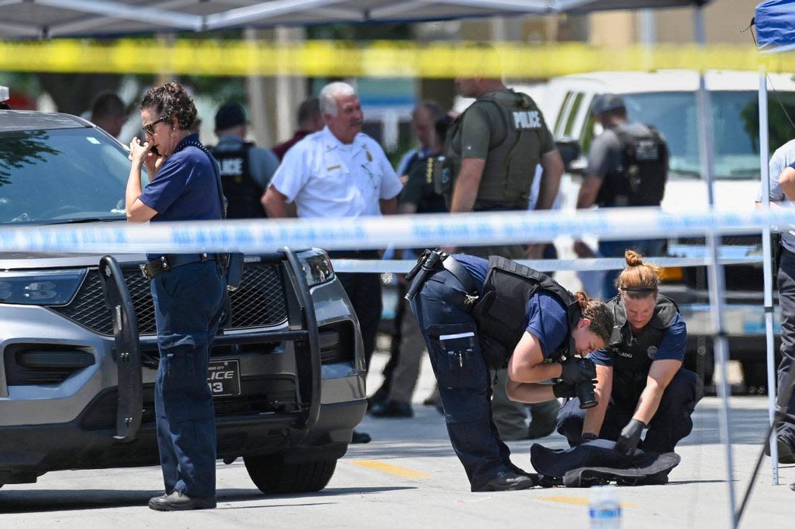 Law enforcement officers and crime scene personnel were on the scene investigating after a North Kansas City Police Officer was shot during a traffic stop Tuesday, July 19, 2022, near 21st and Clay Streets in North Kansas City. Officer Daniel Vasquez died after being shot during the stop. Vasquez had been a member of the North Kansas City Police Department for two years. Crime scene technicians photographed a police vest on the street.