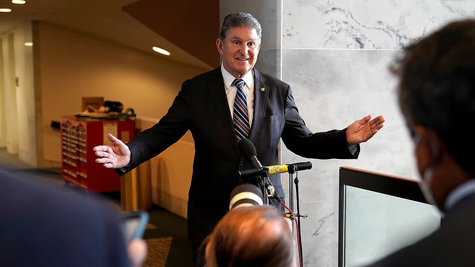Sen. Joe Manchin (D-W.Va.) addresses reporters to discuss Covid-19 on Tuesday, January 4, 2022. He also took questions regarding Build Back Better and other legislative issues.