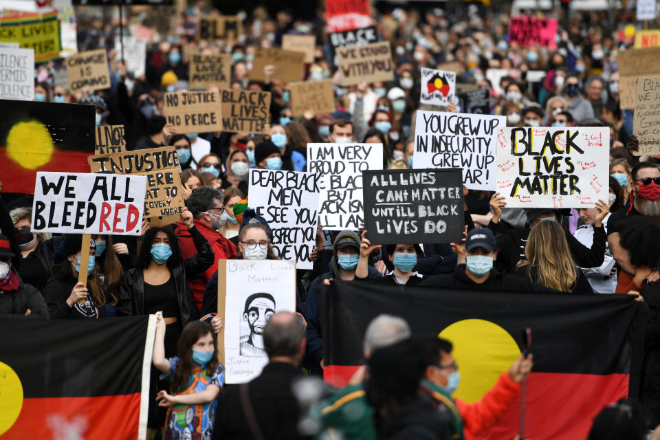 ADELAIDE, AUSTRALIA - JUNE 06: Protesters march in solidarity with protests in the United States on June 06, 2020 in Adelaide, Australia. Events across Australia have been organised in solidarity with protests in the United States following the killing of an unarmed black man George Floyd at the hands of a police officer in Minneapolis, Minnesota and to rally against aboriginal deaths in custody in Australia. (Photo by Tracey Nearmy/Getty Images)