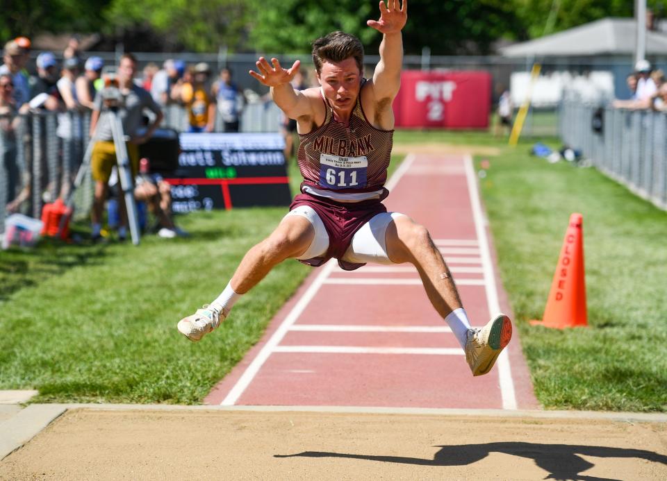 Milbank's Bennett Schwenn leaps to the sand pit while competing in the long jump on the final day of the state track meet on Saturday, May 28, 2022, Howard Wood Field in Sioux Falls.