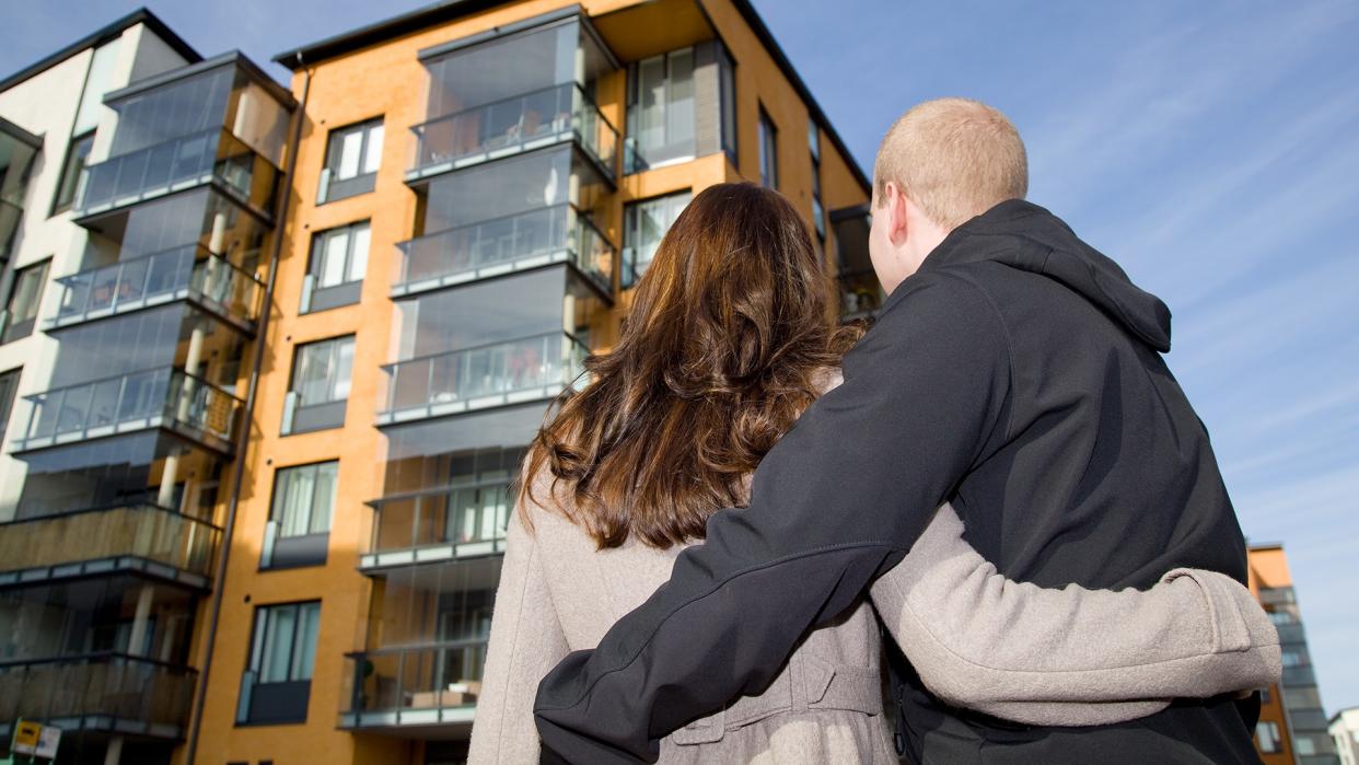 Young couple dreaming of a new home.