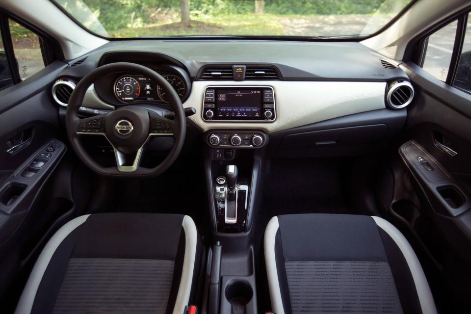 <p>The Versa's cabin is revitalized with much nicer materials and improved build quality, but the rear seat now has less room for people's legs.</p>
